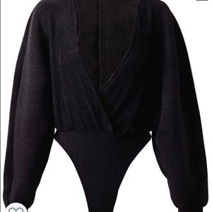 Deep V, Bat Wing Bodysuit.. new without tags
